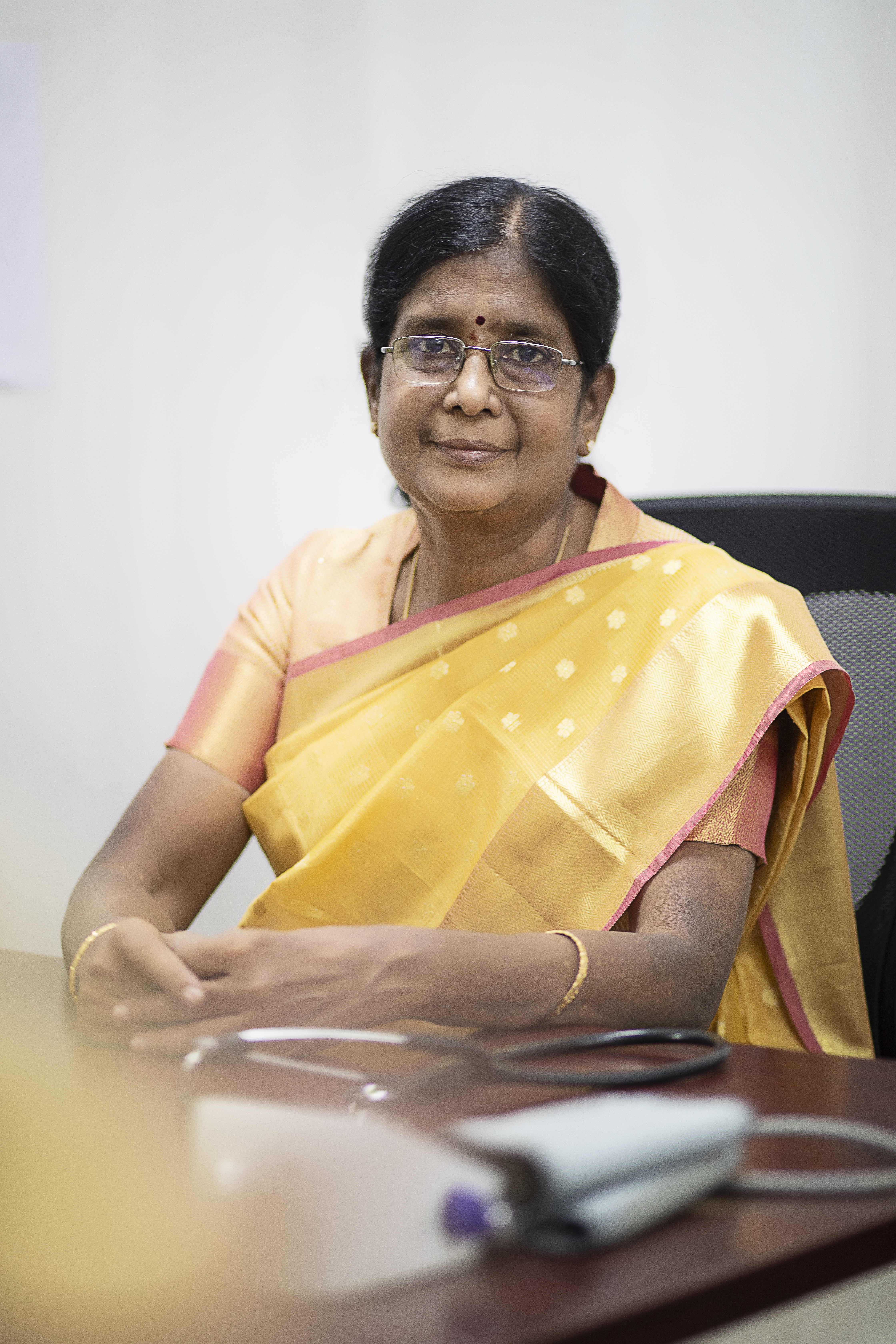 Dr. Radha